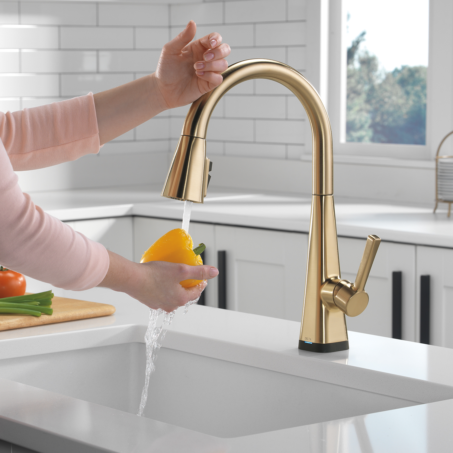 Delta Touch₂O Technology helps keep your kitchen faucet clean, even when your hands aren't. A simple touch anywhere on the spout or kitchen faucet handle with your wrist or forearm activates the flow of water at the temperature where your faucet handle is set. These kitchen sink faucets is equipped with a LED light which changes color to alert you to the water's temperature and elimiates any possible surprises or discomfort..